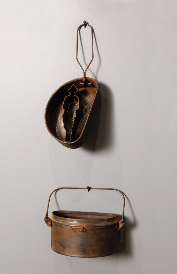 Serve: a new recipe for sacrifice - _Serve_ (detail: mess tin and cookie cutter). Photo: Guy Robinson Serve: a new recipe for sacrifice - _Serve_ (detail: mess tin and cookie cutter). Photo: Guy Robinson